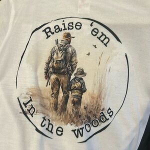 Long sleeve graphic tshirt very soft material 
Raise’ em In the woods